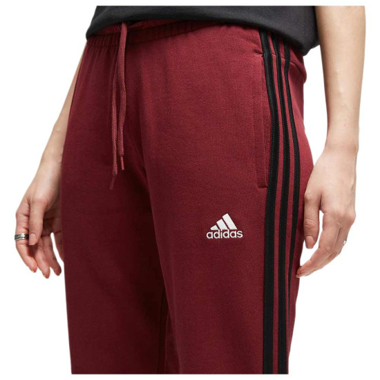 Adidas Γυναικείο παντελόνι φόρμας Essentials 3-Stripes French Terry Cuffed Pants Adidas Γυναικείο παντελόνι φόρμας Essentials 3-Stripes French Terry Cuffed Pants
